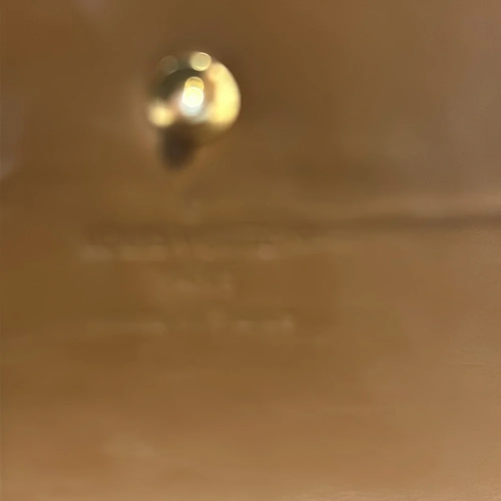 LOUIS VUITTON MONOGRAM VERNIS LONG WALLET TRIFOLD IN BRONZE